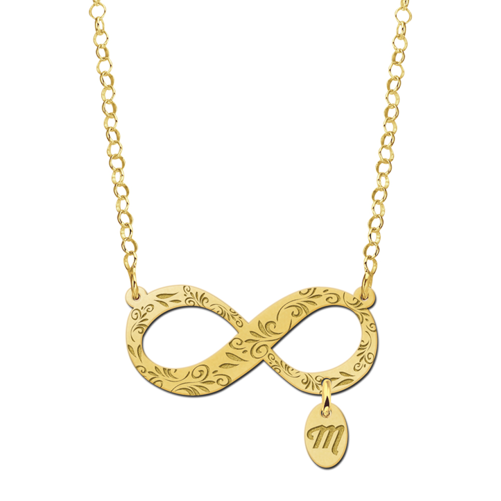 Gold infinity necklace with elegant engraving and initial charm