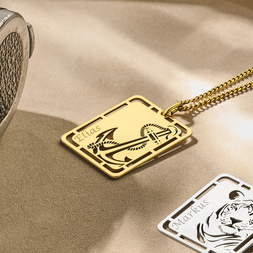 Gold pendant with anchor and name engraving