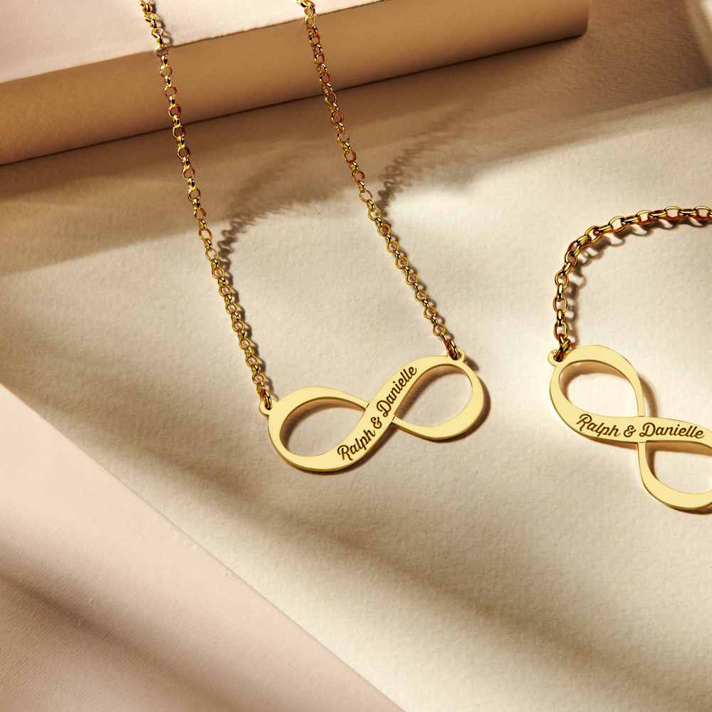 Gold infinity necklace with two engraved names Gold infinity necklace with two engraved names