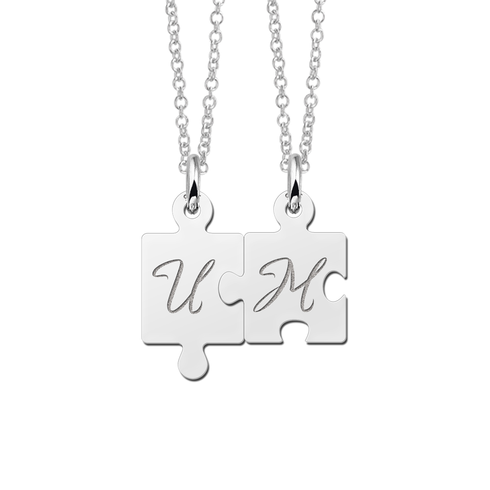 Silver interlocking pendant, puzzle pieces