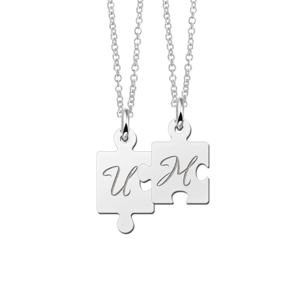 Silver interlocking pendant, puzzle pieces