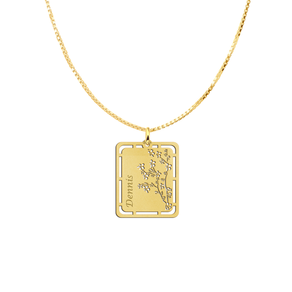Gold pendant with floral design and name engraving